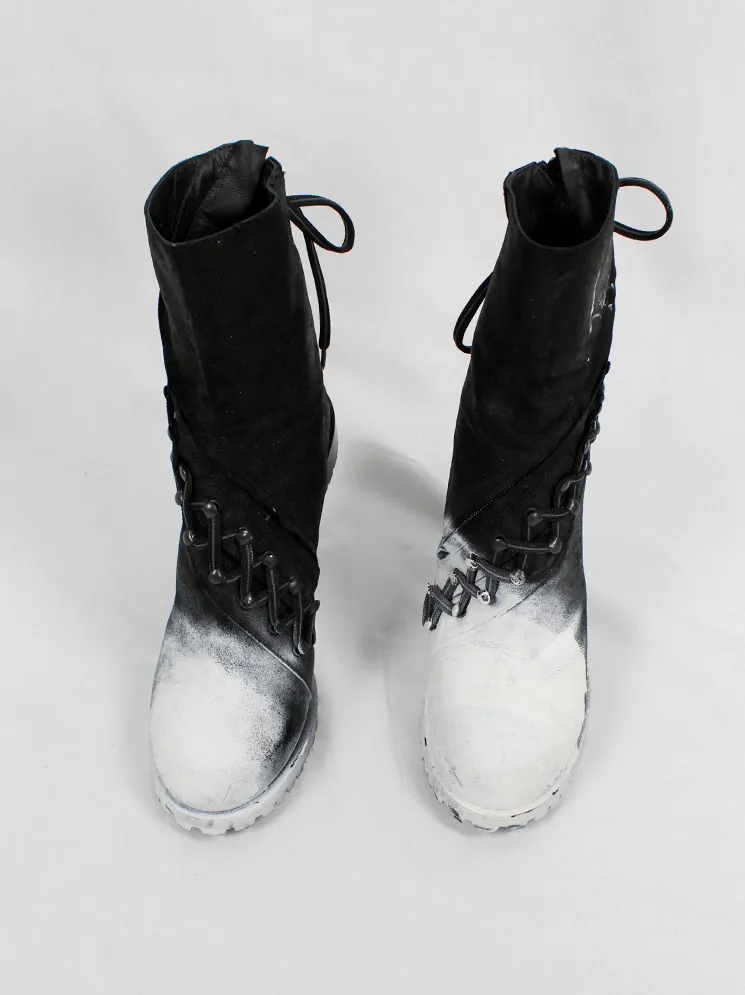 A.F. Vandevorst white spraypainted stiletto combat boots Fall 2015 performance.