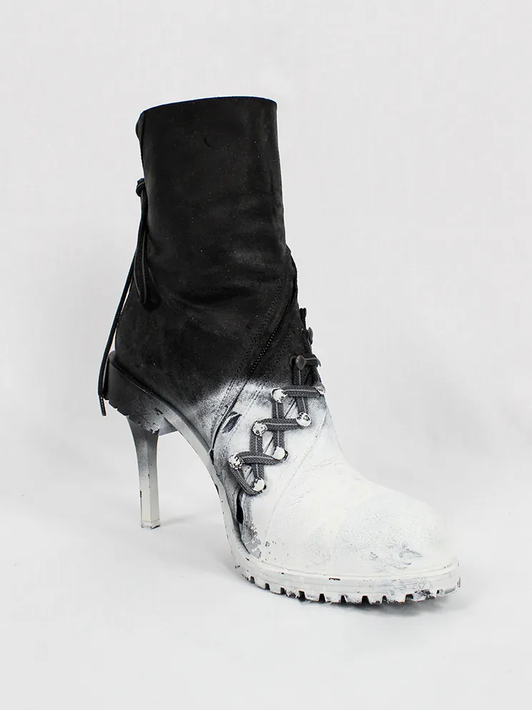 A.F. Vandevorst white spraypainted stiletto combat boots Fall 2015 performance.