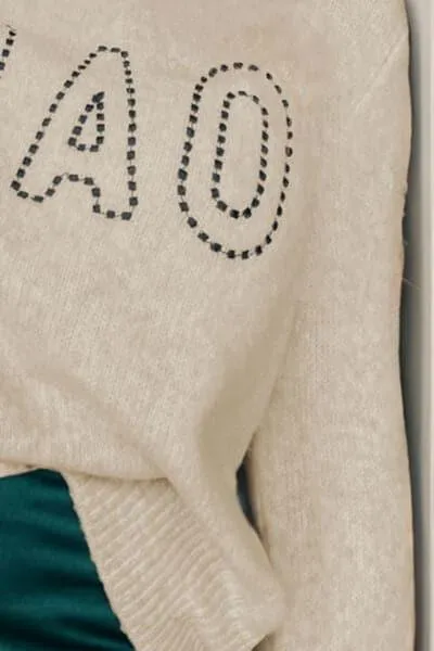 CIAO Sweater with Round Neck and Dropped Shoulders.