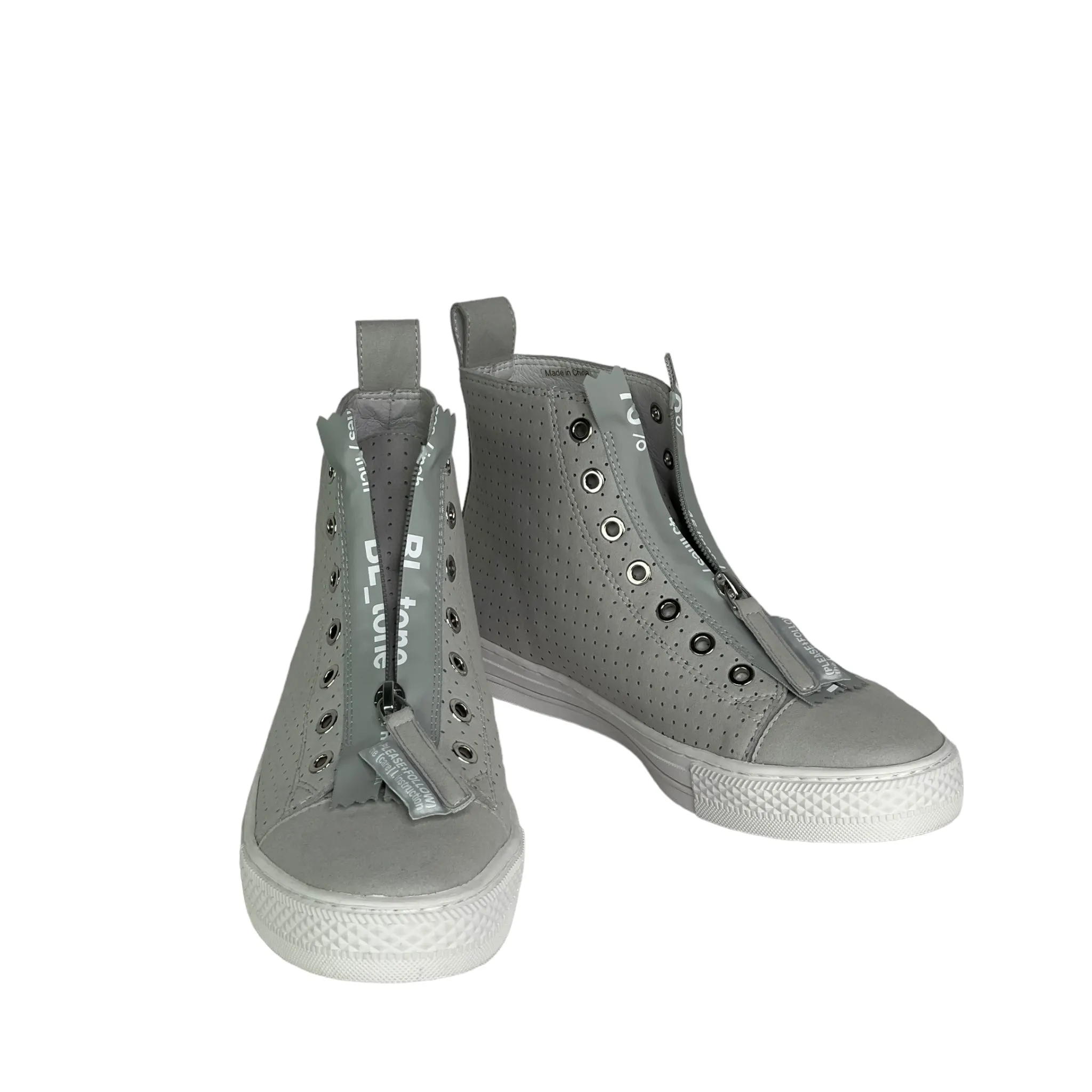 High Top Zip Sneaker.