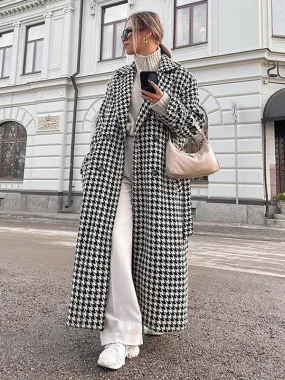 Winter coat houndstooth pattern full length with notched lapel and buttons.